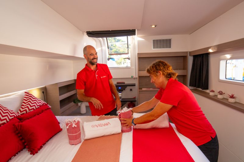 6-Caribbean-Charter-Yacht VIENNA-crew-performing-housekeeping-service-in-cabin